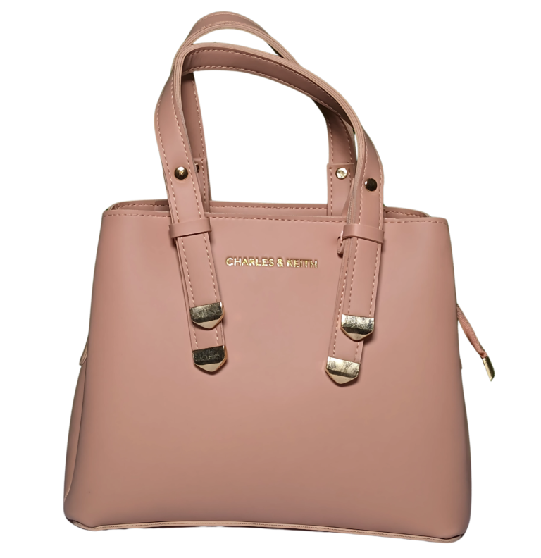 Dusty Rose Crossbody Bag made of durable PU leather with spacious compartments, an adjustable strap, and a compact design for everyday use.